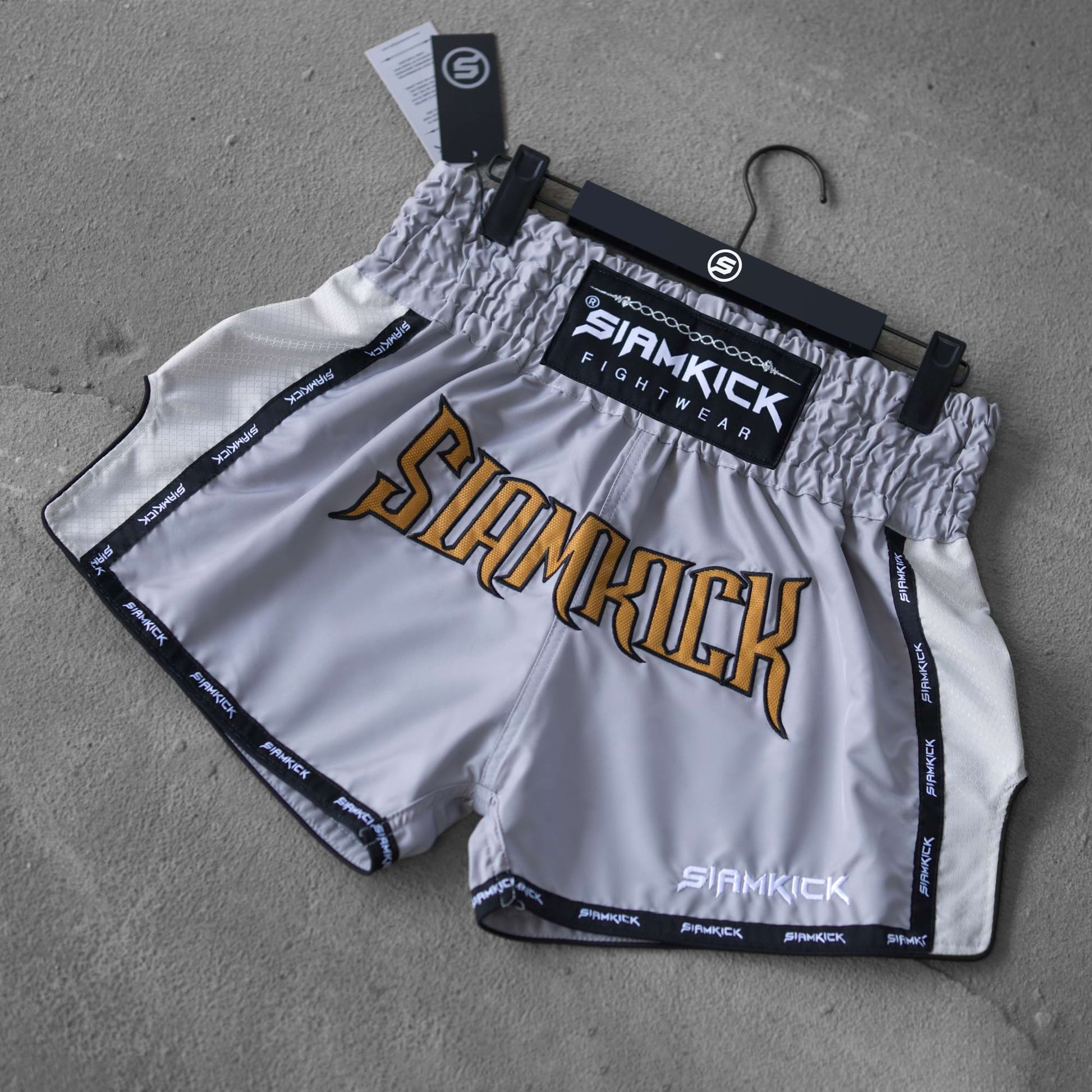 white and grey muay thai shorts