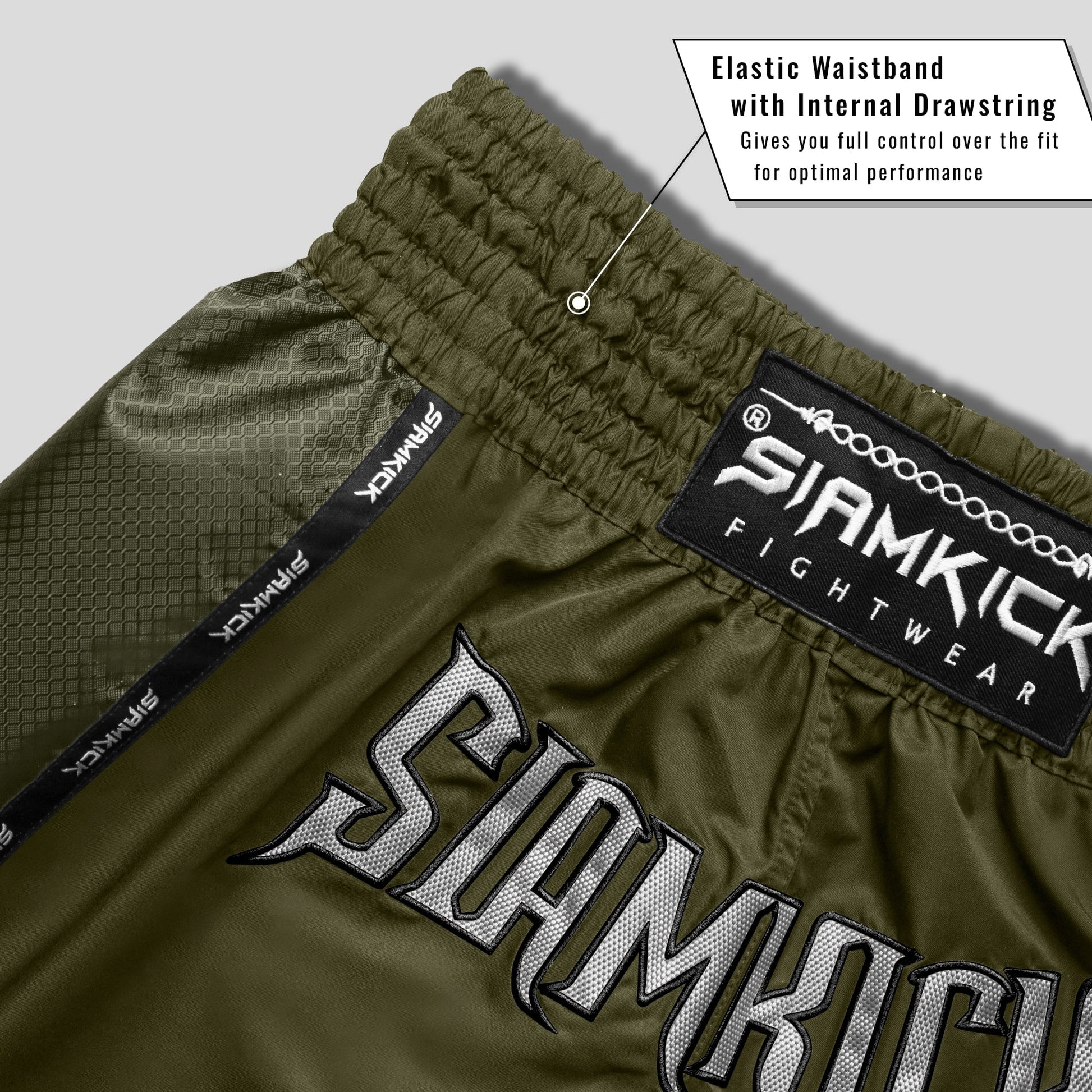 green muay thai shorts close up