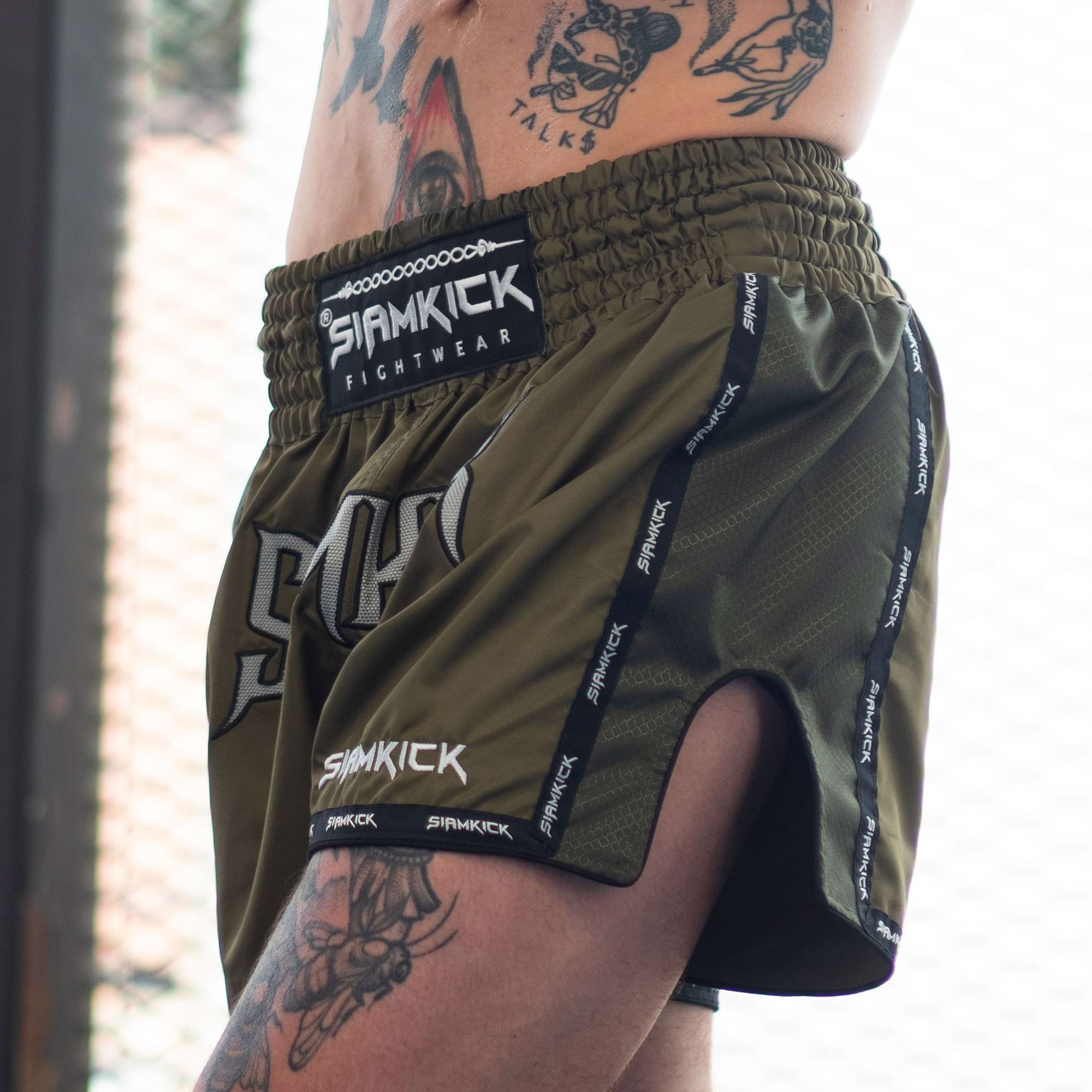 green retro muay thai shorts