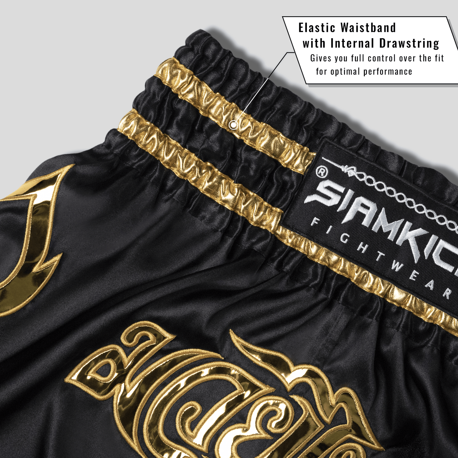 Black and Gold Muay Thai Shorts